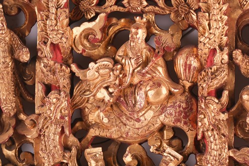 Lot 206 - A Chinese Chaozho carved giltwood panel, late...