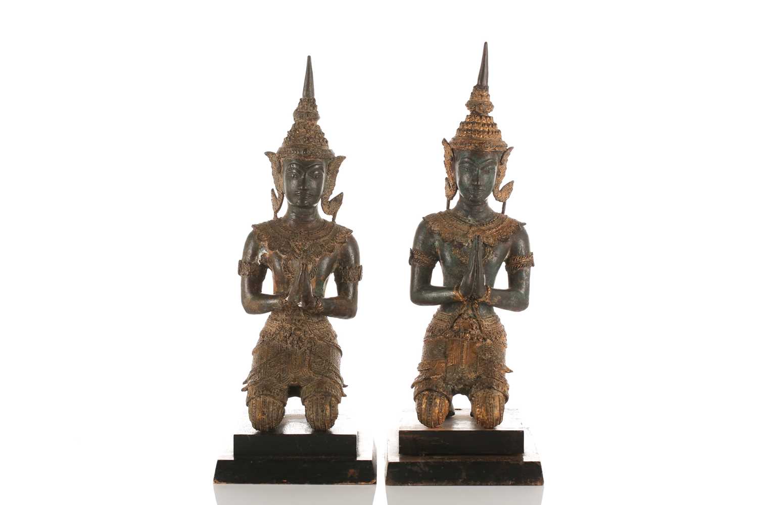 Lot 214 - A near pair of Thai parcel gilt bronze Buddhas,...