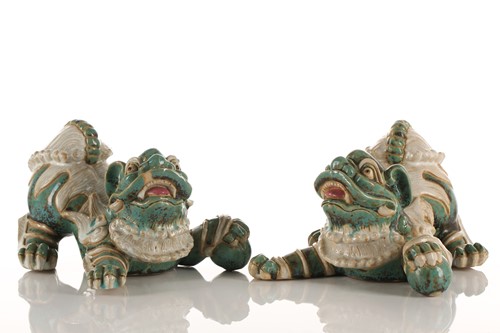 Lot 208 - A pair of Shiwan pottery temple lions, 20th...