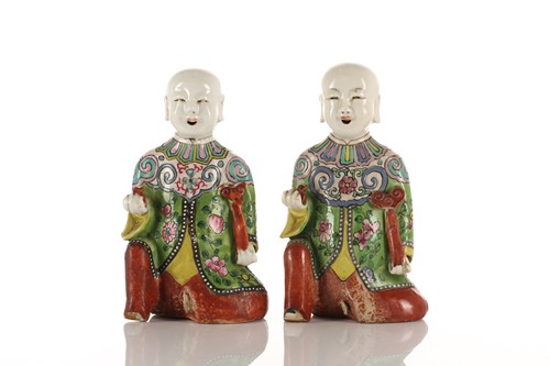 Lot 225 - A near pair of Chinese porcelain 'Laughing Boy'...