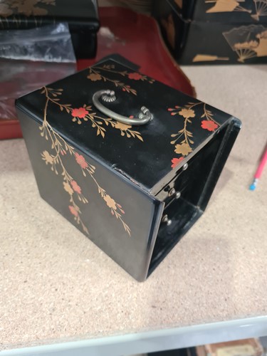 Lot 97 - A small collection of Japanese lacquered boxes,...