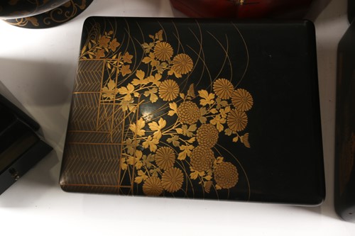 Lot 97 - A small collection of Japanese lacquered boxes,...