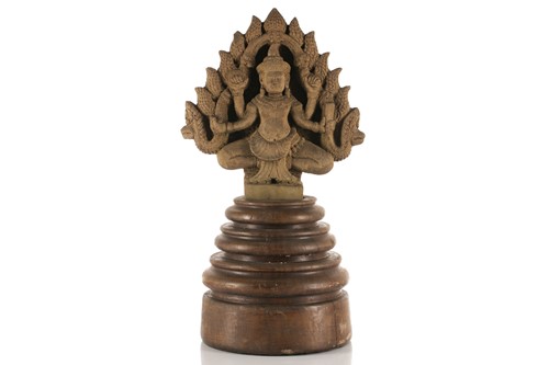 Lot 233 - A Cambodian carved sandstone figure of Shiva...