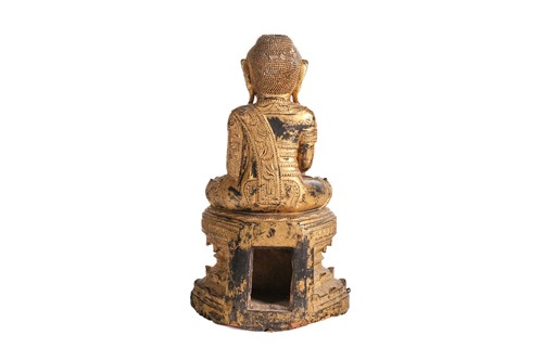 Lot 154 - A carved, lacquered and gilt wood figure of...