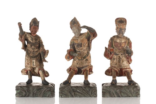Lot 197 - Three Chinese carved wood and polychrome...