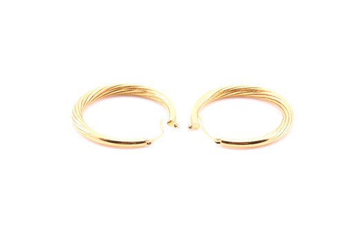 Lot 111 - A pair of 18carat gold hoop earrings of...