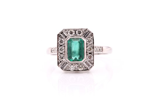 Lot 226 - An emerald and diamond cluster ring, on white...