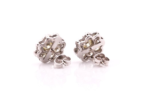 Lot 145 - A pair of diamond cluster earrings, each...