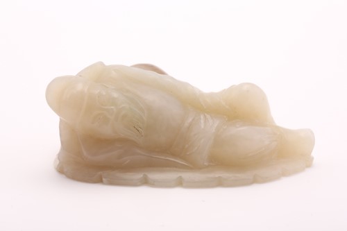 Lot 202 - A Chinese jade figure of Lu Dongbin, carved...
