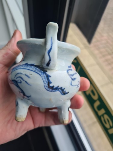 Lot 234 - A Chinese porcelain tripod censer, in the Ming...