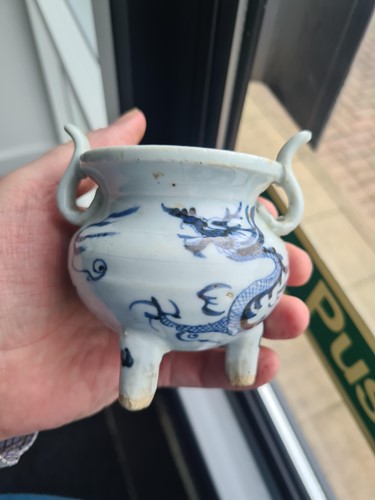Lot 234 - A Chinese porcelain tripod censer, in the Ming...