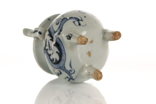 Lot 234 - A Chinese porcelain tripod censer, in the Ming...