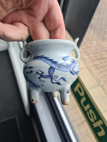 Lot 234 - A Chinese porcelain tripod censer, in the Ming...