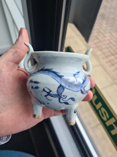 Lot 234 - A Chinese porcelain tripod censer, in the Ming...
