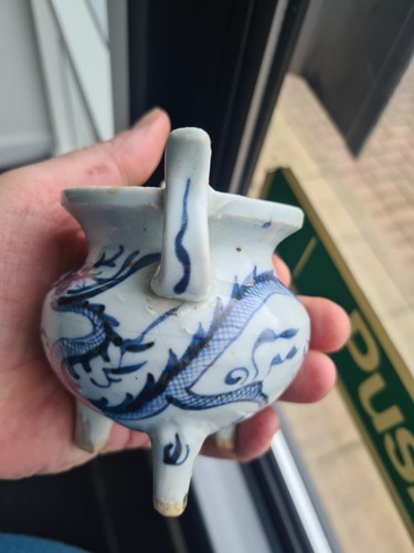 Lot 234 - A Chinese porcelain tripod censer, in the Ming...