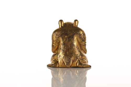 Lot 175 - A Chinese Han style gilt-bronze figure of an...
