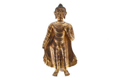Lot 113 - A gilt bronze Buddha Shakyamuni, Nepal or...