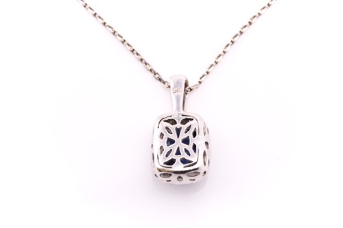 Lot 10 - A white metal pendant and chain stamped 9ct...
