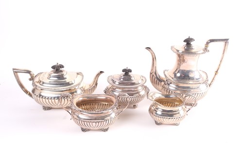 Lot 331 - A silver four piece tea service, of boat form,...
