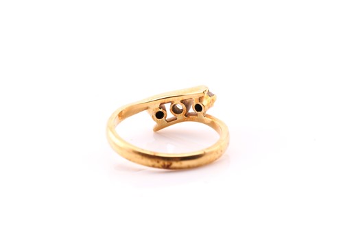 Lot 128 - An 18carat gold three stone diamond ring, the...