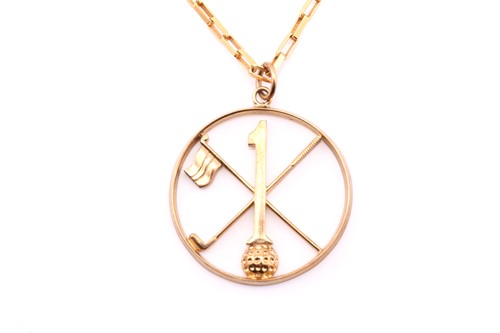 Lot 116 - A 9carat gold "Hole in 1" golfing pendant, 28...