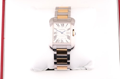 Lot 422 - An 18ct gold and steel Cartier Tank Anglais...