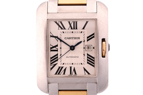 Lot 422 - An 18ct gold and steel Cartier Tank Anglais...