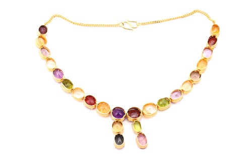 Lot 2 - A multi-gem set pendant necklace, oval...