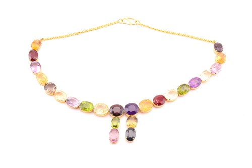 Lot 2 - A multi-gem set pendant necklace, oval...