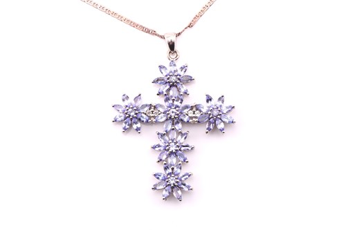 Lot 237 - A tanzanite cross on chain, the marquise and...