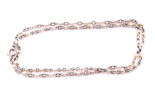 Lot 268 - A pearl set chain, set with evenly spaced...