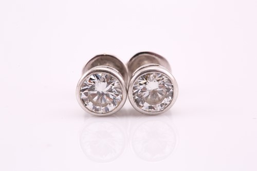 Lot 58 - A pair of brilliant cut diamond ear studs, rub...