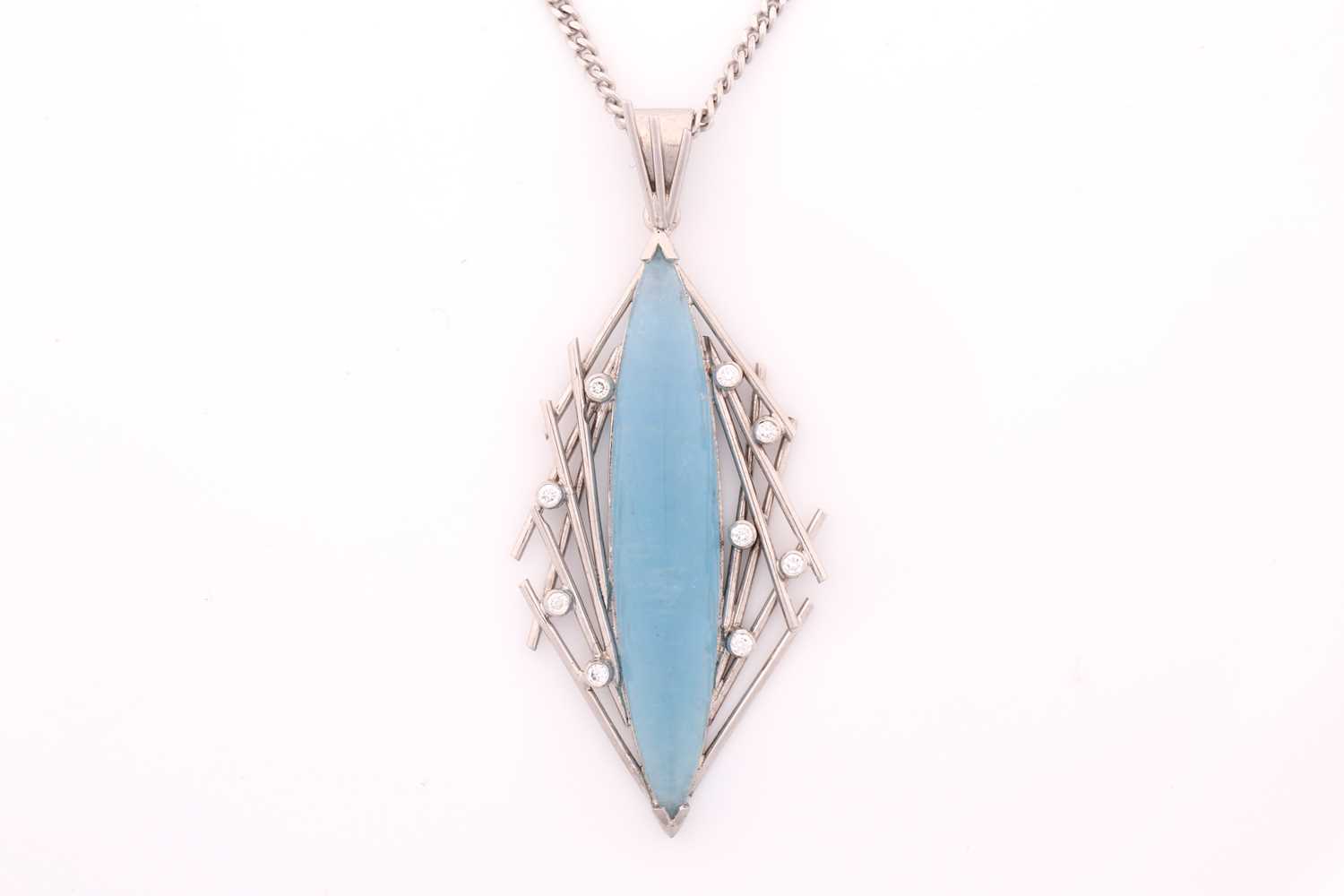 Lot 57 - An aquamarine and diamond pendant on chain,...