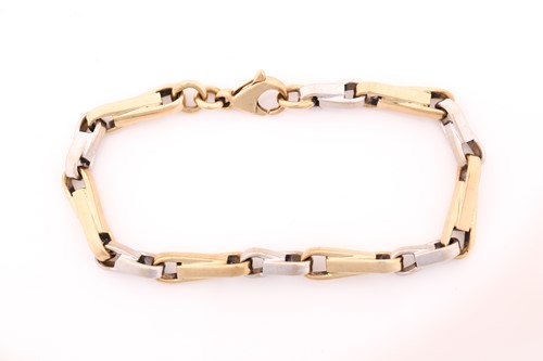 Lot 210 - A 9ct white and yellow gold link bracelet,...