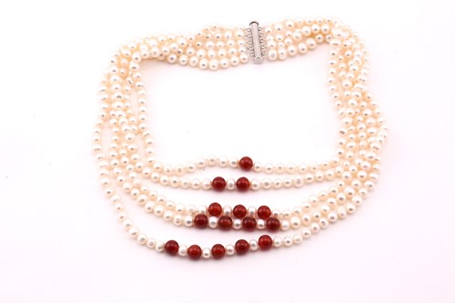 Lot 233 - A five strand freshwater pearl and carnelian...