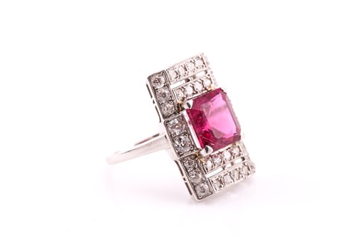 Lot 79 - A pink tourmaline and diamond panel ring, the...