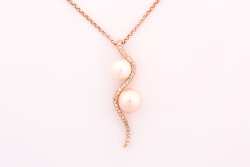 Lot 240 - A cultured pearl and diamond pendant on chain,...