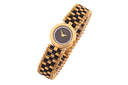 Lot 365 - A Raymond Weil Lady's gold plated quartz watch...