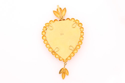 Lot 76 - A Middle Eastern yellow metal heart-shaped...