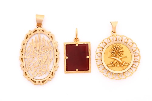 Lot 73 - Two Middle Eastern yellow precious metal...