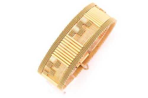 Lot 80 - An Egyptian mesh bracelet; the ribbed and...