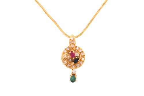Lot 120 - A sapphire, ruby, emerald and diamond pendant...