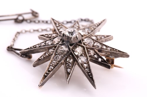 Lot 204 - A late Victorian diamond star brooch, the...