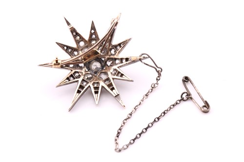 Lot 204 - A late Victorian diamond star brooch, the...