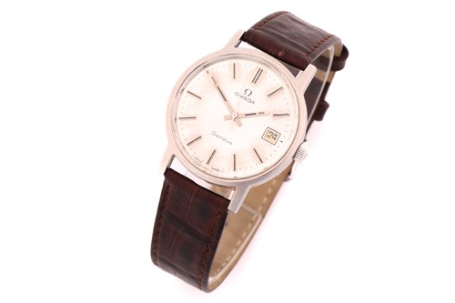 Lot 869 - A hand-wound Omega Geneve with a steel case...