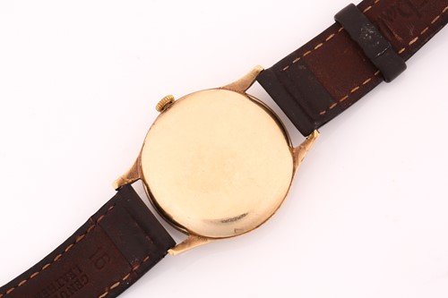 Lot 880 - A hand-wound vintage Omega with a 9ct yellow...