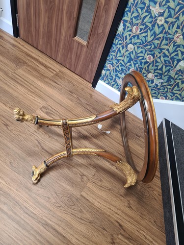 Lot 291 - A French Empire style eagle head carved and...