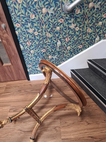 Lot 291 - A French Empire style eagle head carved and...