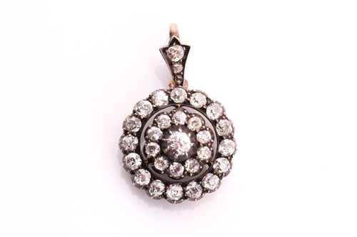 Lot 445 - A Victorian old cut diamond target pendant,...