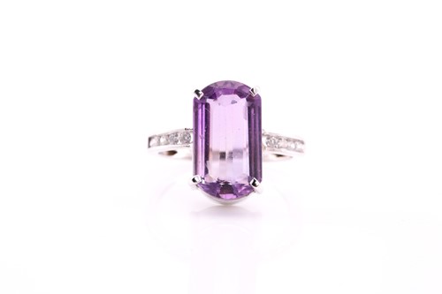 Lot 206 - An amethyst and diamond dress ring, consisting...